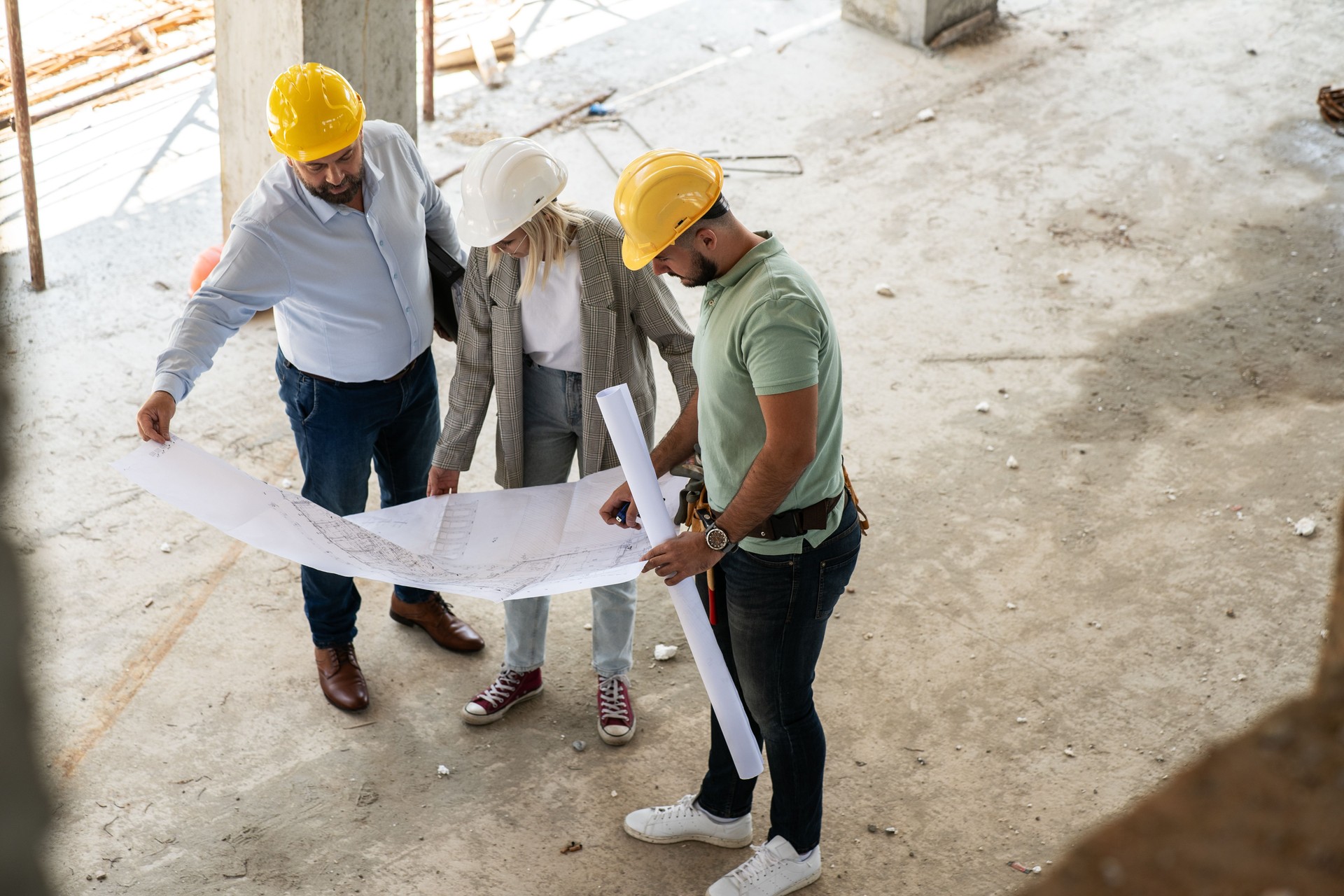 A group of architects works together on-site